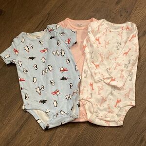Three New Carter’s Onesies     Size 18M